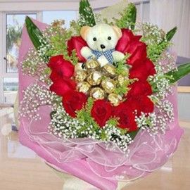 11 Red Roses with 9 Ferrero Rochers and Bear Handbouquet