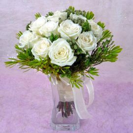 12 White Roses with lanuginosa in a vase