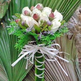 12 White Roses With Leucadendron And Pine Foliage Wrap With Drac