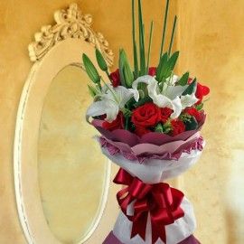 3 Lilies & 12 Red Roses Hand Bouquet Special Design