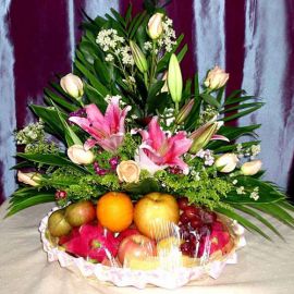 8 Champagne Roses with Pink Lily and Fruits Basket Arrangement