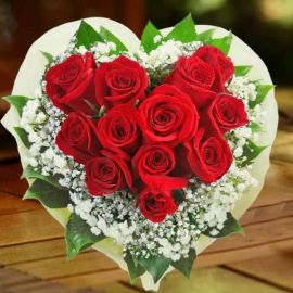 12 Red Roses Hand Bouquet Arranged in Heart Shape.