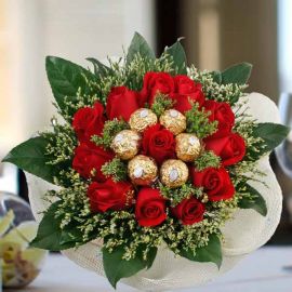 12 Red Roses With Rochers Hand Bouquet Delivery