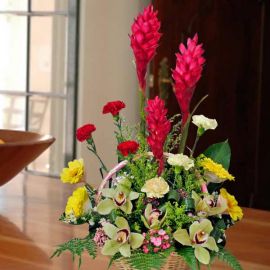 Cymbidium orchids with Red Ginger flower table arrangement